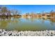 View of the pond that includes a fountain in the center at 3533 Mulberry Way, Duluth, GA 30096
