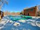 Community pool with brick building and fence. Pool is covered for the winter at 3533 Mulberry Way, Duluth, GA 30096