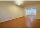 Neutral room with wood floors and white trim at 3533 Mulberry Way, Duluth, GA 30096