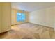 Neutral room with carpet and natural light through windows at 3533 Mulberry Way, Duluth, GA 30096
