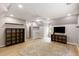 Bright bonus bedroom with wood floors, recessed lighting, shelving, and ceiling fan at 4137 Donna Ct, Ellenwood, GA 30294