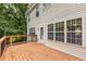 Exterior view of a two-story home with a wood deck at 4137 Donna Ct, Ellenwood, GA 30294