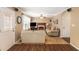Cozy living room with a fireplace, neutral colored walls, and a ceiling fan at 4137 Donna Ct, Ellenwood, GA 30294