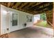 Exterior view of an outdoor patio area with access to the basement at 4137 Donna Ct, Ellenwood, GA 30294