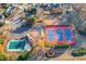 Aerial view of community amenities: pool, tennis court, and playground at 1435 Great Oaks Dr, Lawrenceville, GA 30045