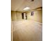 Finished basement with a picture on the wall and neutral carpeting at 1435 Great Oaks Dr, Lawrenceville, GA 30045