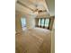 Spacious bedroom with carpeted floors, a trey ceiling, and natural light at 1435 Great Oaks Dr, Lawrenceville, GA 30045