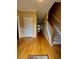 Inviting entryway with gleaming hardwood floors and staircase access to upper levels at 1435 Great Oaks Dr, Lawrenceville, GA 30045