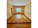 Bright living room with hardwood floors at 1435 Great Oaks Dr, Lawrenceville, GA 30045
