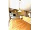 Bright living area with an open kitchen, breakfast bar and a fireplace at 1435 Great Oaks Dr, Lawrenceville, GA 30045