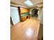 Bonus room with desk, cabinets, and vinyl flooring at 1435 Great Oaks Dr, Lawrenceville, GA 30045