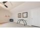 Carpeted bonus room with modern art, natural light, and minimalist furnishings at 535 Brickleberry Ln, Roswell, GA 30075