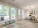 The breakfast nook features large windows offering natural light and views of the private outdoor patio at 535 Brickleberry Ln, Roswell, GA 30075