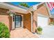 Inviting front entrance with a hanging flower basket and a well-maintained brick facade at 535 Brickleberry Ln, Roswell, GA 30075