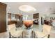 Spacious open kitchen boasts granite countertops, and stainless appliances, with connected breakfast and living areas at 535 Brickleberry Ln, Roswell, GA 30075