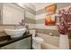 Stylish powder room with striped walls, modern vessel sink and vanity at 535 Brickleberry Ln, Roswell, GA 30075