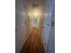 Hallway with hardwood floors and multiple doors at 95 Heartwood Xing, Dallas, GA 30157