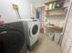 Functional laundry room with modern washer and dryer units at 95 Heartwood Xing, Dallas, GA 30157