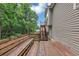 Wooden deck with stairs leading to the backyard at 1735 Silver Way, Lithia Springs, GA 30122