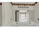 Bathroom featuring a double sink vanity and soaking tub at 1735 Silver Way, Lithia Springs, GA 30122
