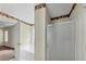 Bathroom features a shower, tub and views to the bedroom at 1735 Silver Way, Lithia Springs, GA 30122