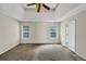 Spacious bedroom with neutral walls and a ceiling fan at 1735 Silver Way, Lithia Springs, GA 30122