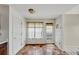 Eat-in kitchen space featuring a back door entrance and window at 1735 Silver Way, Lithia Springs, GA 30122