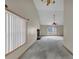 Bright living room with vaulted ceilings, fireplace and large windows providing plenty of natural light at 1735 Silver Way, Lithia Springs, GA 30122