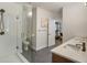 Modern bathroom featuring a glass-enclosed shower, double vanity, and stylish fixtures at 790 North Ne Ave # 209, Atlanta, GA 30306