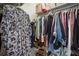 Walk-in closet with extensive hanging space and built-in shelving for organized storage at 790 North Ne Ave # 209, Atlanta, GA 30306