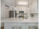 Modern kitchen featuring stainless steel appliances, white cabinets, and a large island at 790 North Ne Ave # 209, Atlanta, GA 30306