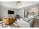 Airy living room featuring an open floor plan, modern lighting, and seamless access to the kitchen at 790 North Ne Ave # 209, Atlanta, GA 30306