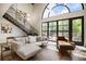 Bright and airy living room with comfortable seating, an arched window, and modern decor at 790 North Ne Ave # 209, Atlanta, GA 30306