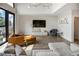 Bright living room featuring an open floor plan, modern lighting, and comfortable seating at 790 North Ne Ave # 209, Atlanta, GA 30306