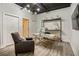 Bright office space with industrial-style exposed ceiling, chic shelving, and comfortable seating at 790 North Ne Ave # 209, Atlanta, GA 30306