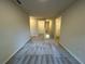 A carpeted hallway on the upper level showcasing access to bedrooms and the stairway at 1601 Dosk Ave, Lawrenceville, GA 30044