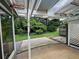 A view from the covered patio into a well-manicured backyard at 333 Etoawha Vly, Woodstock, GA 30189