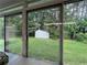 View of the backyard with a storage shed through the sliding glass doors at 333 Etoawha Vly, Woodstock, GA 30189