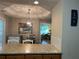 View of dining area with a table, chairs, and granite countertops at 333 Etoawha Vly, Woodstock, GA 30189