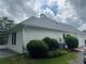 Exterior view showcasing the house siding, roof, and air conditioning unit at 333 Etoawha Vly, Woodstock, GA 30189