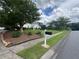 Exterior image shows a home's driveway with an American flag next to the mailbox at 333 Etoawha Vly, Woodstock, GA 30189