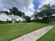 Well-manicured front yard featuring lush green grass and attractive landscaping enhancing the home's curb appeal at 333 Etoawha Vly, Woodstock, GA 30189