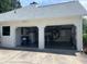 Two-car garage exterior with side yard and ample driveway space at 333 Etoawha Vly, Woodstock, GA 30189