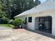 Exterior of a two-car garage with driveway, lawn, and landscaping at 333 Etoawha Vly, Woodstock, GA 30189