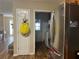 View of kitchen with stainless steel refrigerator and door to laundry area at 333 Etoawha Vly, Woodstock, GA 30189