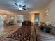 Living area with hardwood floors and a view of the dining room, providing an open and airy feel at 333 Etoawha Vly, Woodstock, GA 30189
