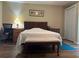 A well-lit main bedroom featuring hardwood floors at 333 Etoawha Vly, Woodstock, GA 30189