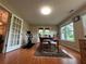 Spacious office/dining room featuring hardwood floors, a ceiling light, and natural light at 333 Etoawha Vly, Woodstock, GA 30189
