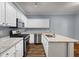 Well-lit kitchen with stainless steel appliances and granite countertops at 3737 Town Square Nw Cir # 6, Kennesaw, GA 30144