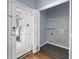 Mud room features an exterior door with window, an interior door, and neutral paint at 3737 Town Square Nw Cir # 6, Kennesaw, GA 30144